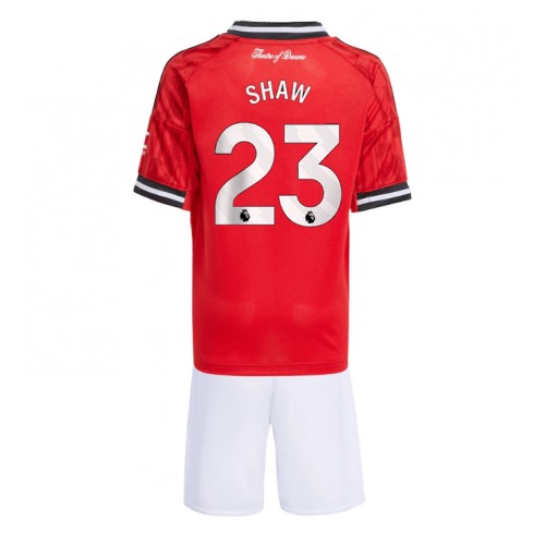 Manchester United Luke Shaw #23 Hemmatröja Barn 2025-26 Kortärmad (+ Korta byxor)